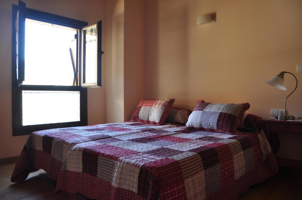 Cama o camas de una habitación en Casa Rural Cancias