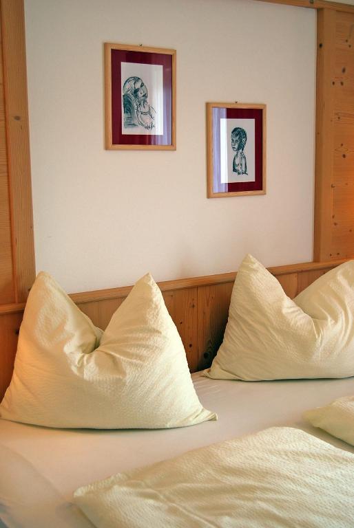 Postel nebo postele na pokoji v ubytování Gasthof Weidmannshof