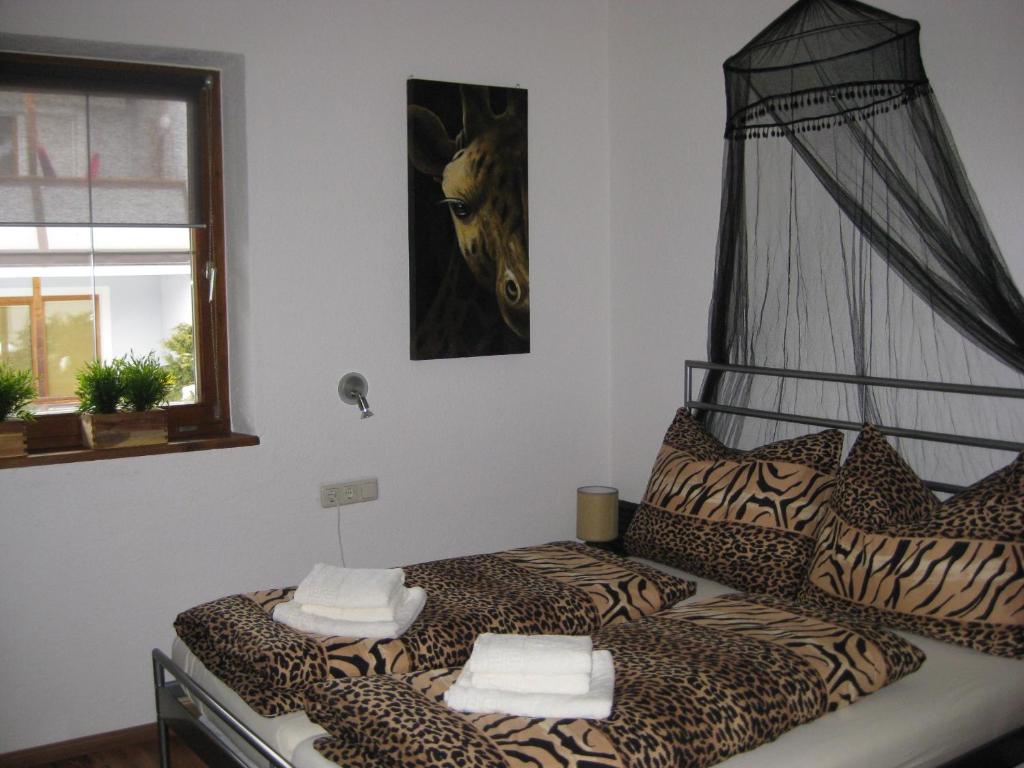 Een bed of bedden in een kamer bij Apart Via Claudia Augusta