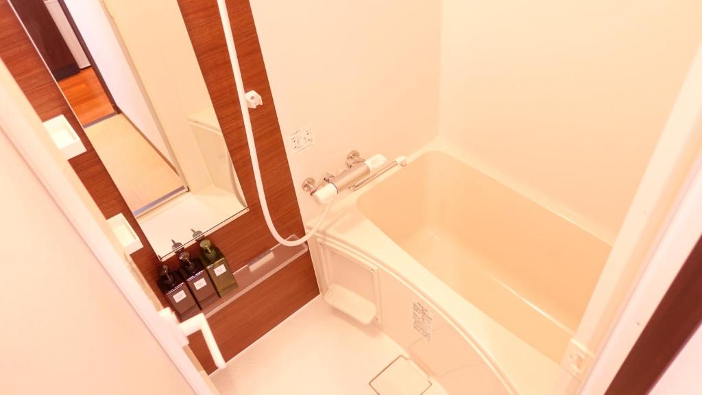 Koupelna v ubytování COCORO HOTEL