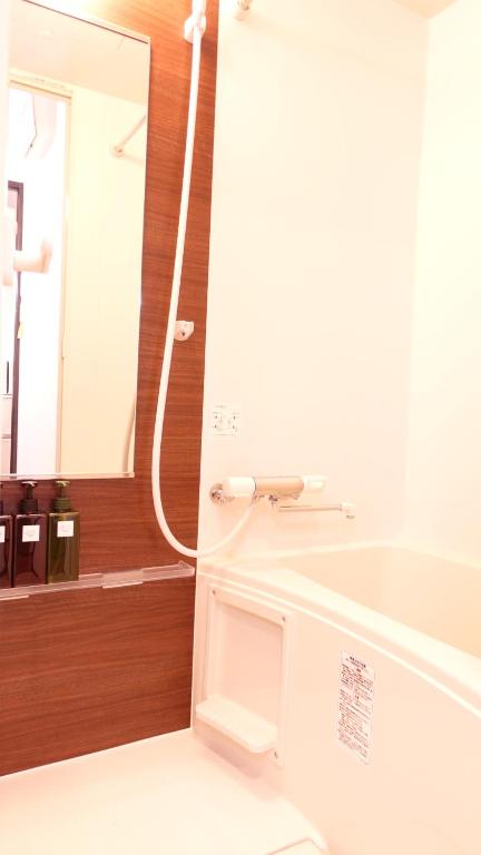 Koupelna v ubytování COCORO HOTEL