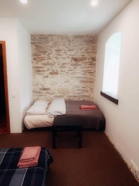Postel nebo postele na pokoji v ubytování Statek "Two brooms", Apartment
