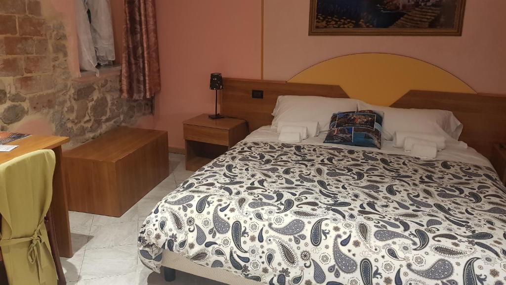 Posteľ alebo postele v izbe v ubytovaní Locanda Dalla Compagnia