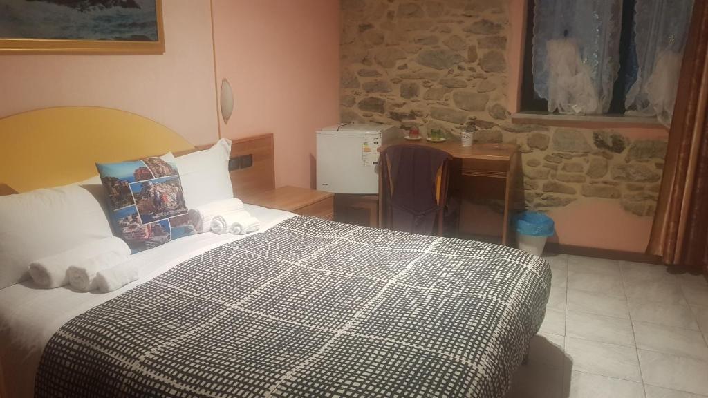 Posteľ alebo postele v izbe v ubytovaní Locanda Dalla Compagnia