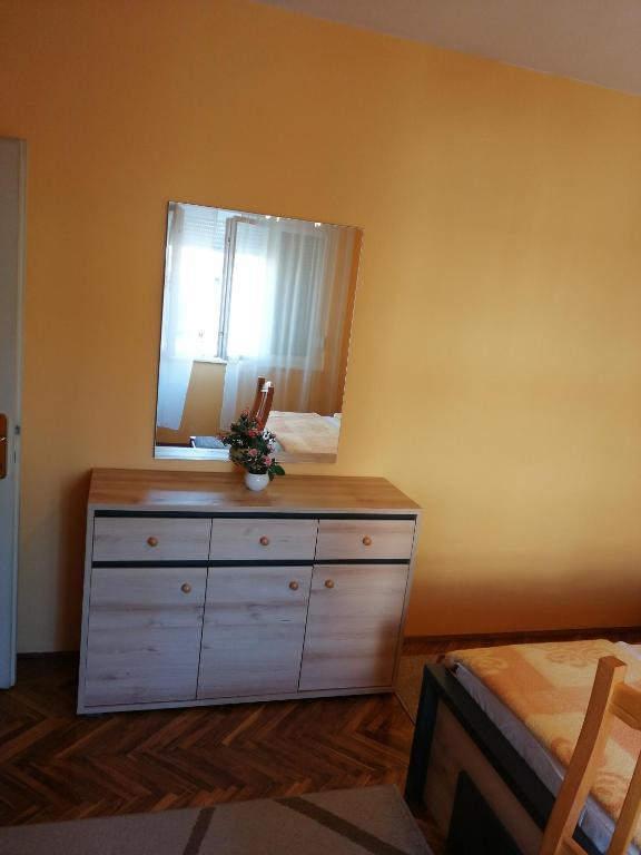 Postel nebo postele na pokoji v ubytování Apartment Singa