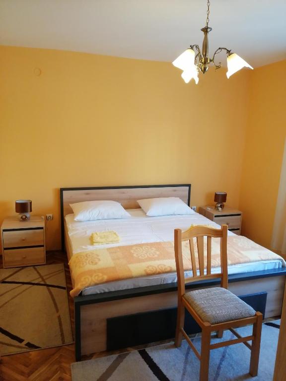 Postel nebo postele na pokoji v ubytování Apartment Singa