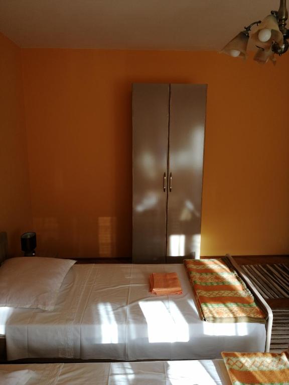Postel nebo postele na pokoji v ubytování Apartment Singa
