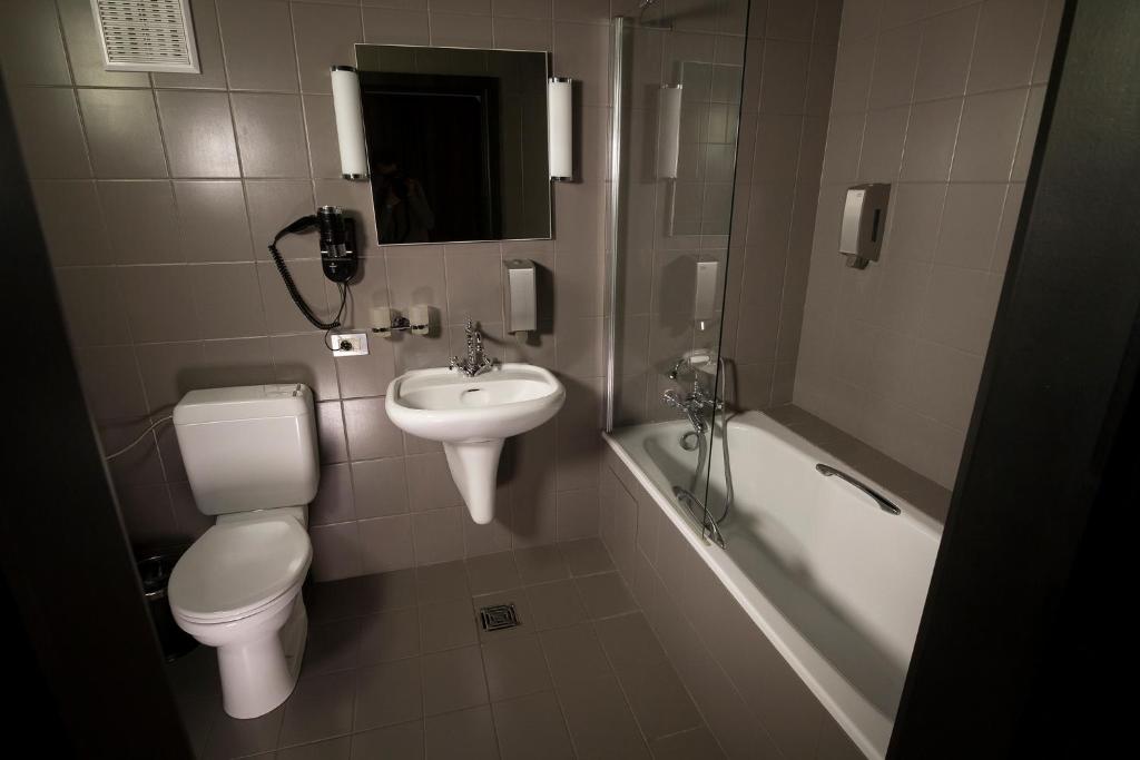 Koupelna v ubytování Hotel Chantecler
