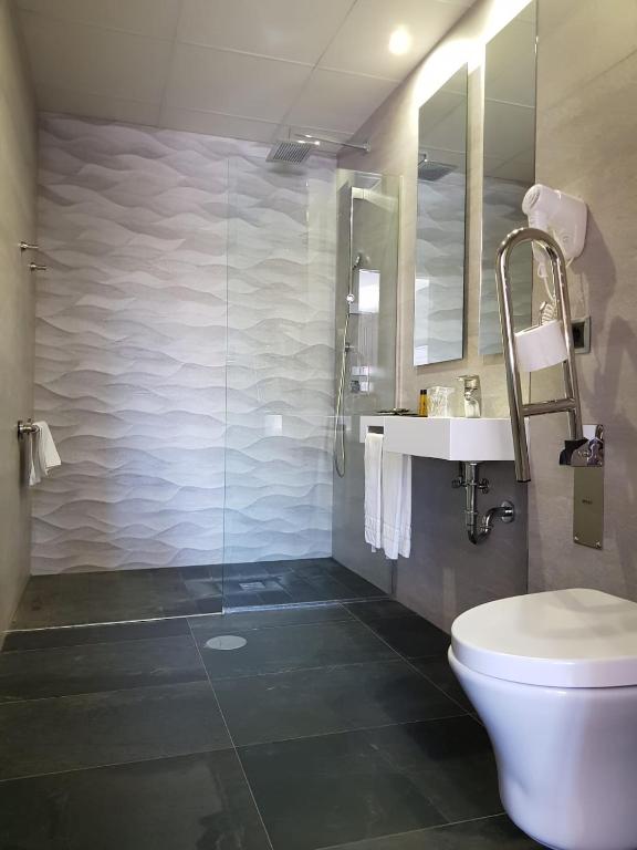 Kúpeľňa v ubytovaní Hotel Condestable Iranzo