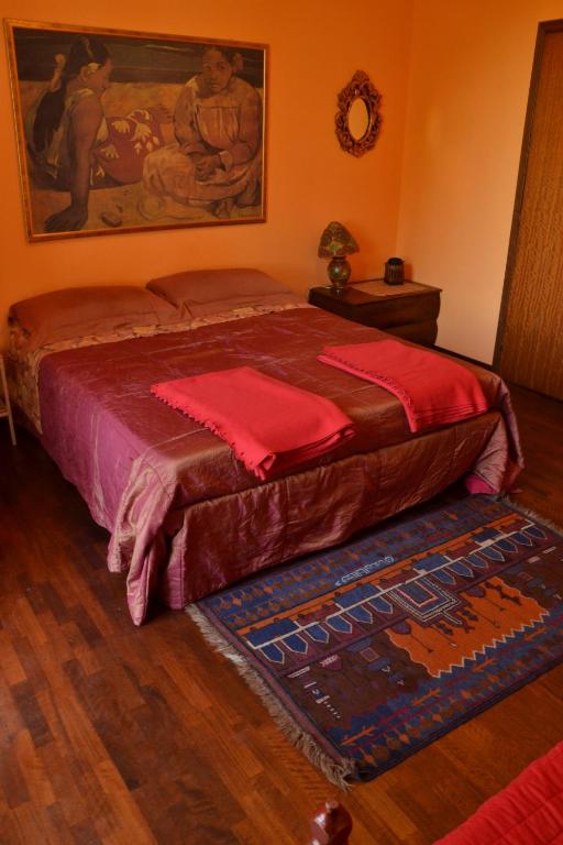 Postel nebo postele na pokoji v ubytování B&B Al Mare Di Greis