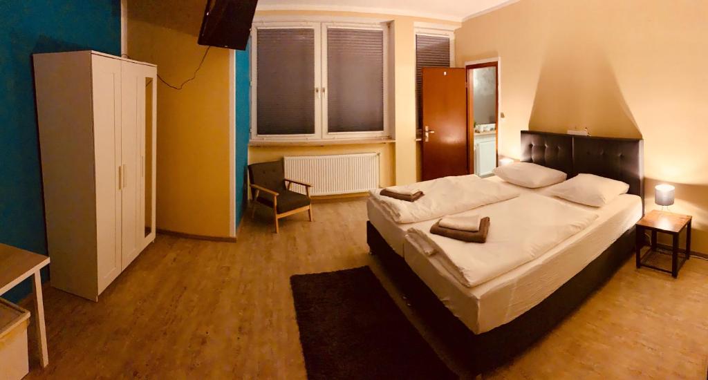 Postel nebo postele na pokoji v ubytování White Pearl Hostel 1