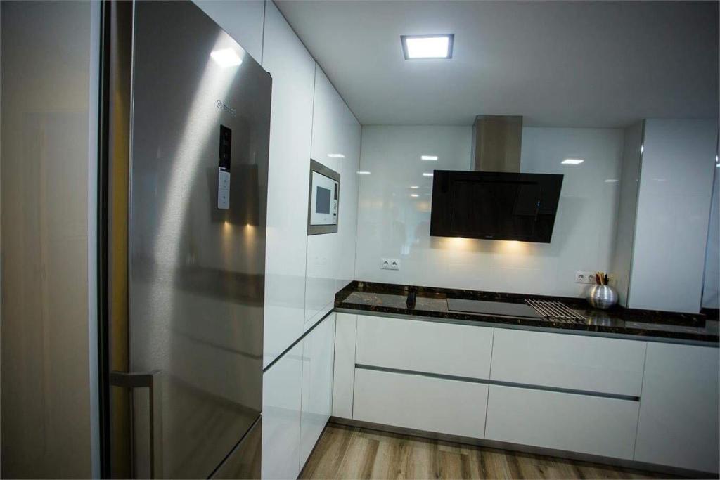 Kuchyňa alebo kuchynka v ubytovaní Apartamento Aurora