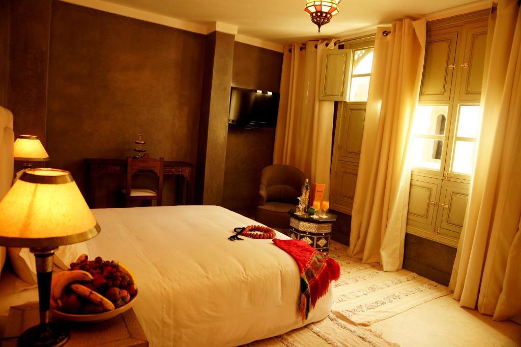 Postel nebo postele na pokoji v ubytování Riad Shama Suites & Spa