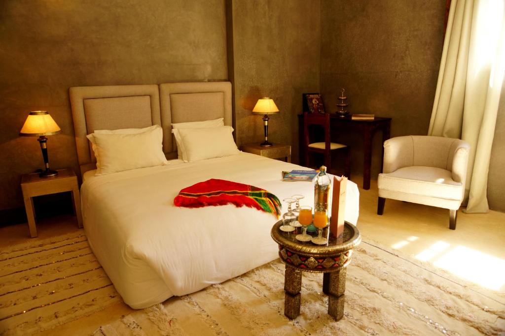 Postel nebo postele na pokoji v ubytování Riad Shama Suites & Spa