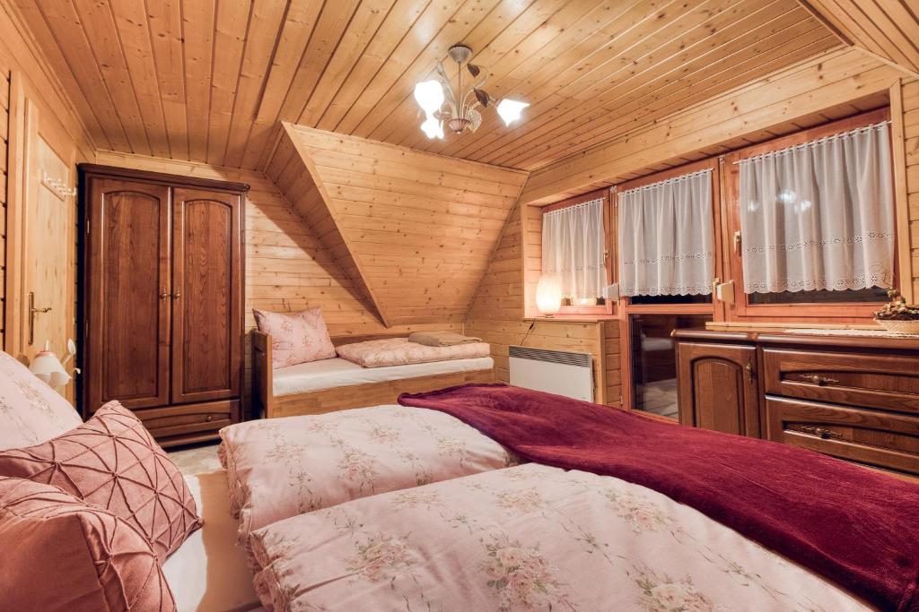 Postel nebo postele na pokoji v ubytování Chata Brusnica