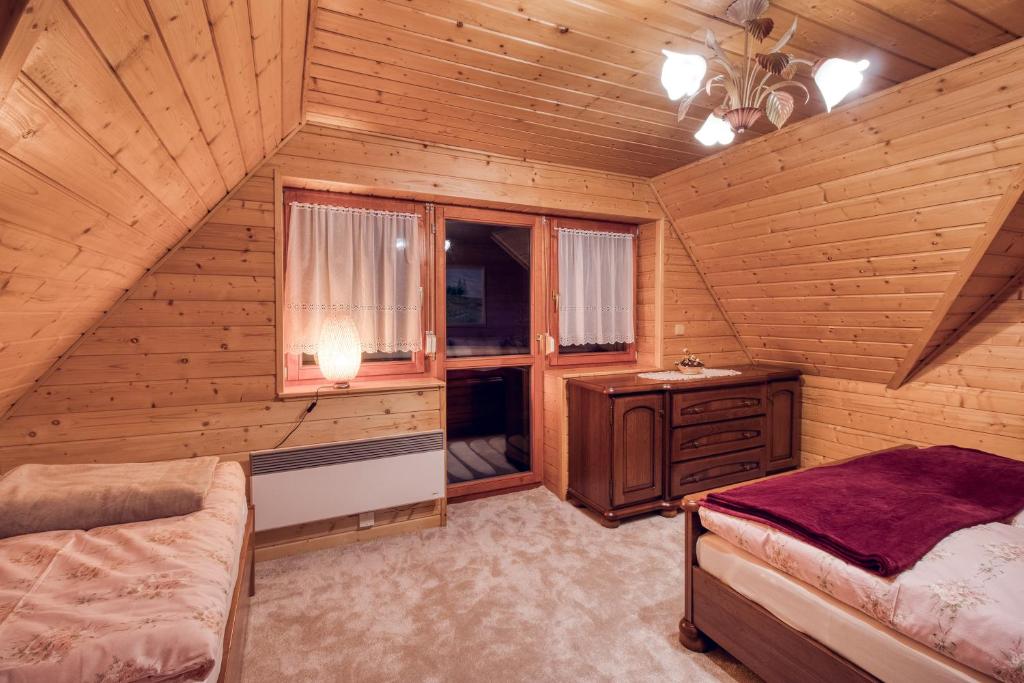 Postel nebo postele na pokoji v ubytování Chata Brusnica