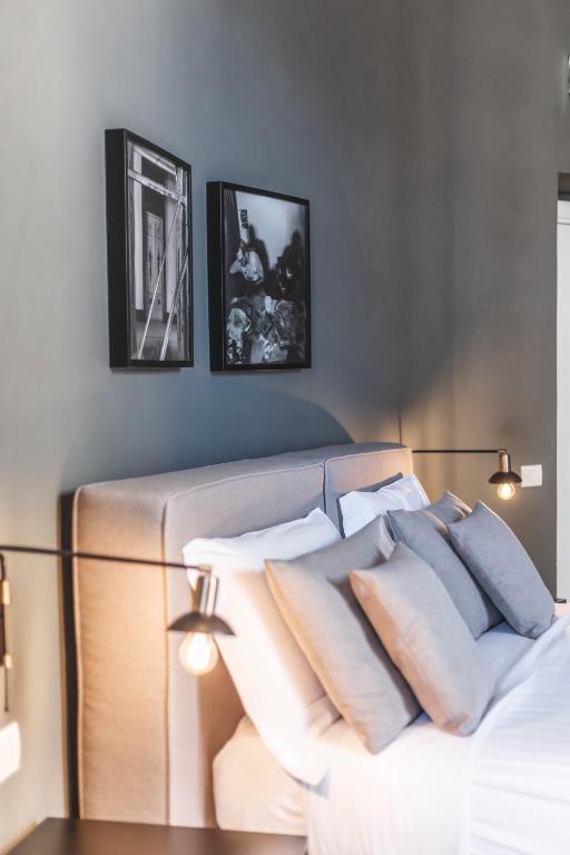 Postel nebo postele na pokoji v ubytování Relais Della Porta