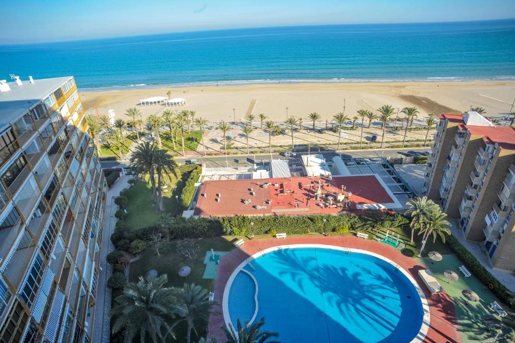 an aerial view of a resort with a beach at Nereo II in Alicante