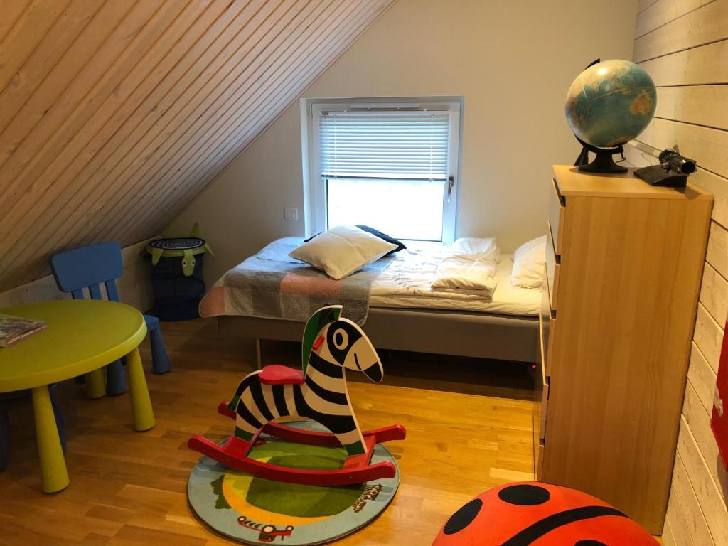Postel nebo postele na pokoji v ubytování Villa Olympia
