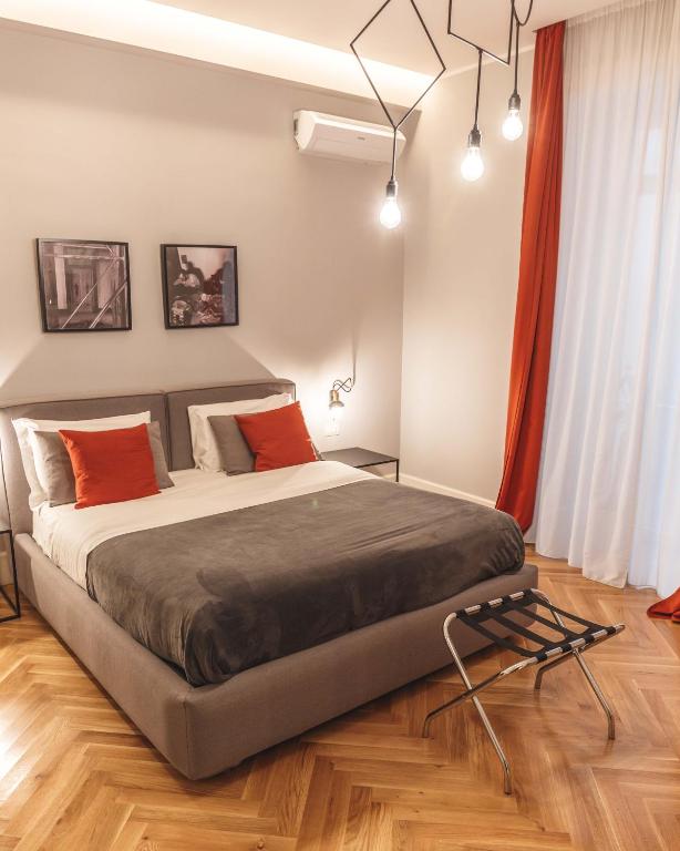 Postel nebo postele na pokoji v ubytování Relais Della Porta