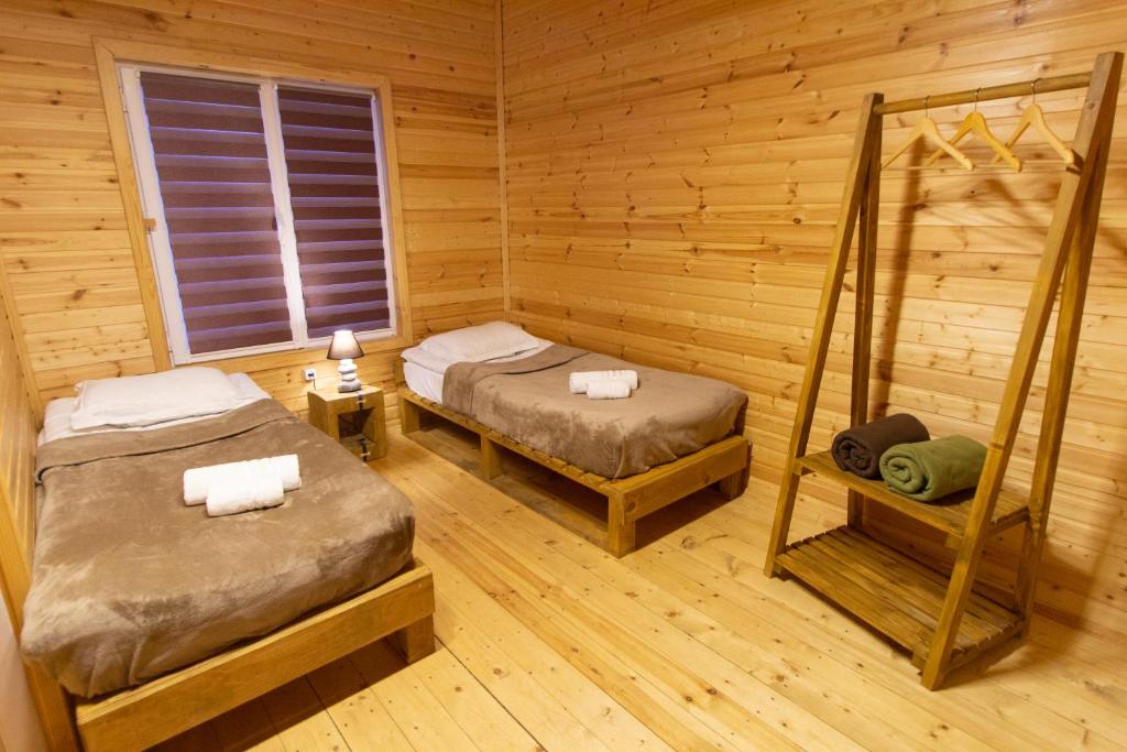 Postel nebo postele na pokoji v ubytování Cottage Shgedi