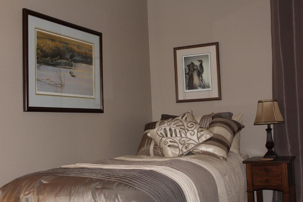 Postel nebo postele na pokoji v ubytování Tailwinds B&B