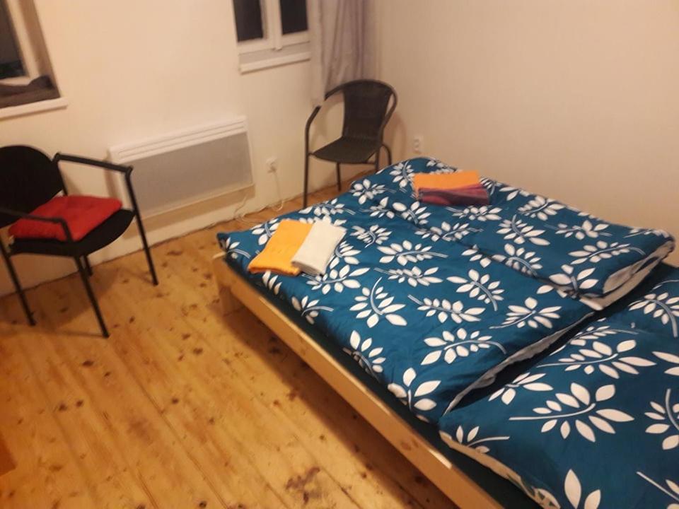 Postel nebo postele na pokoji v ubytování Apartmán pod Mariánskou horou