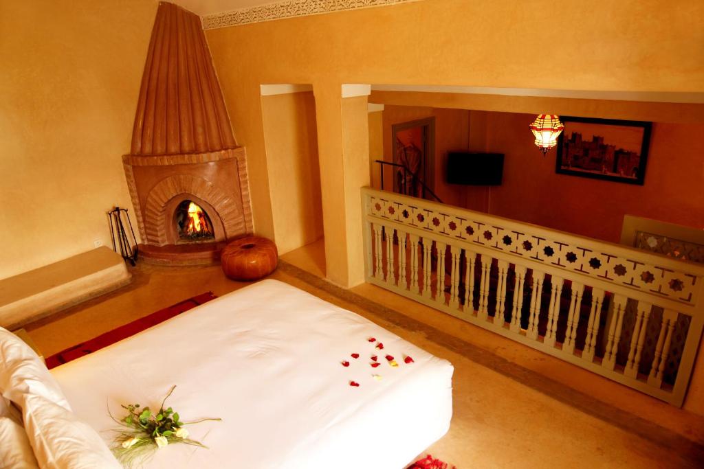 Postel nebo postele na pokoji v ubytování Riad Shama Suites & Spa