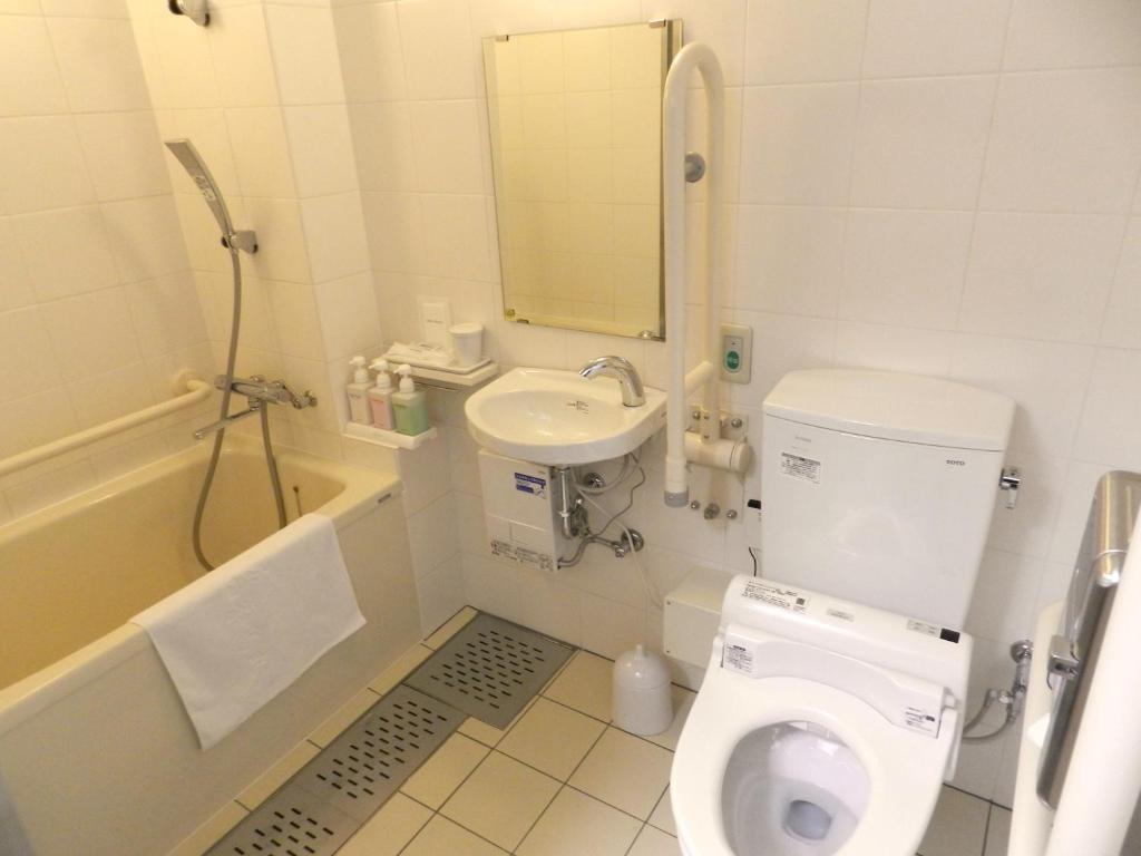 Koupelna v ubytování Check in Shijokarasuma