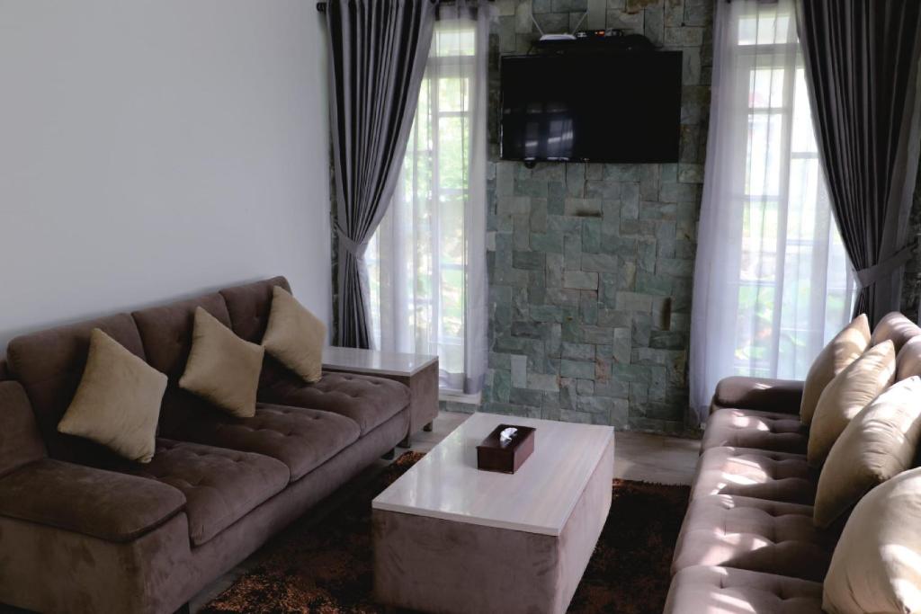Posezení v ubytování Diyar Villas Puncak M6-11