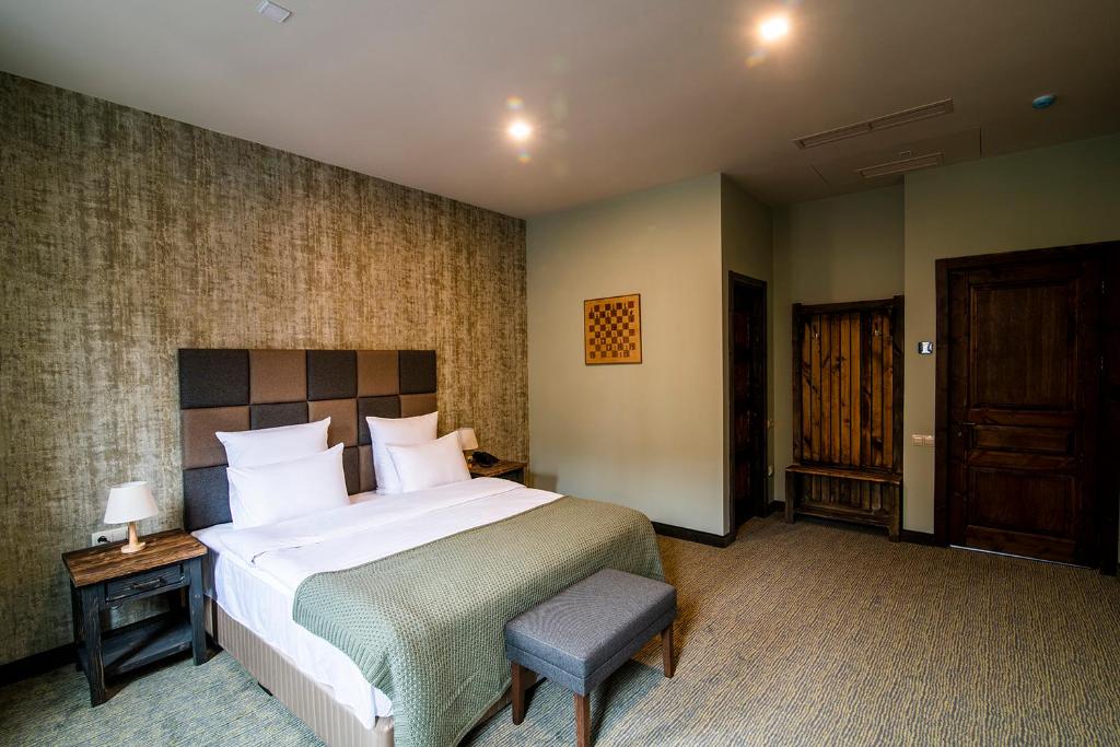 Postel nebo postele na pokoji v ubytování Apricot Hotel Yerevan