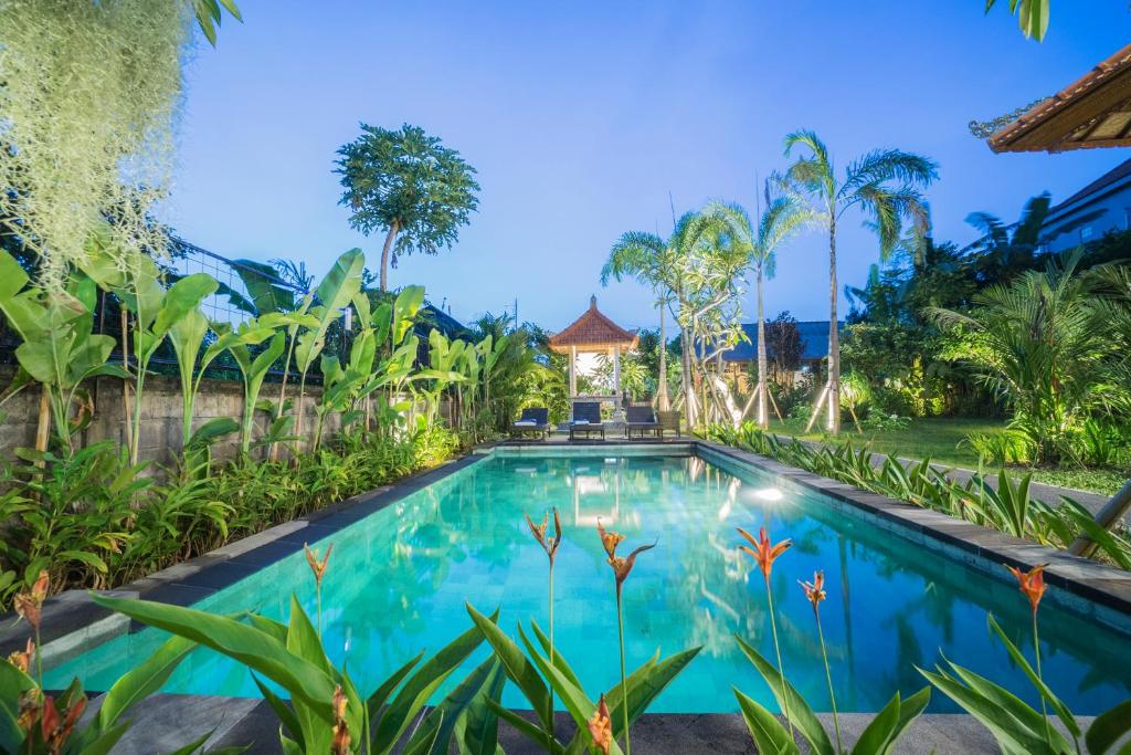 an image of a swimming pool in a villa at Shakara in Ubud