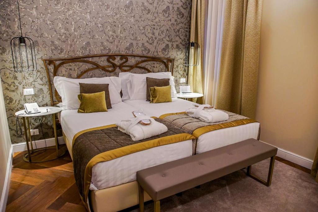 Postel nebo postele na pokoji v ubytování BW Premier Collection CHC Continental
