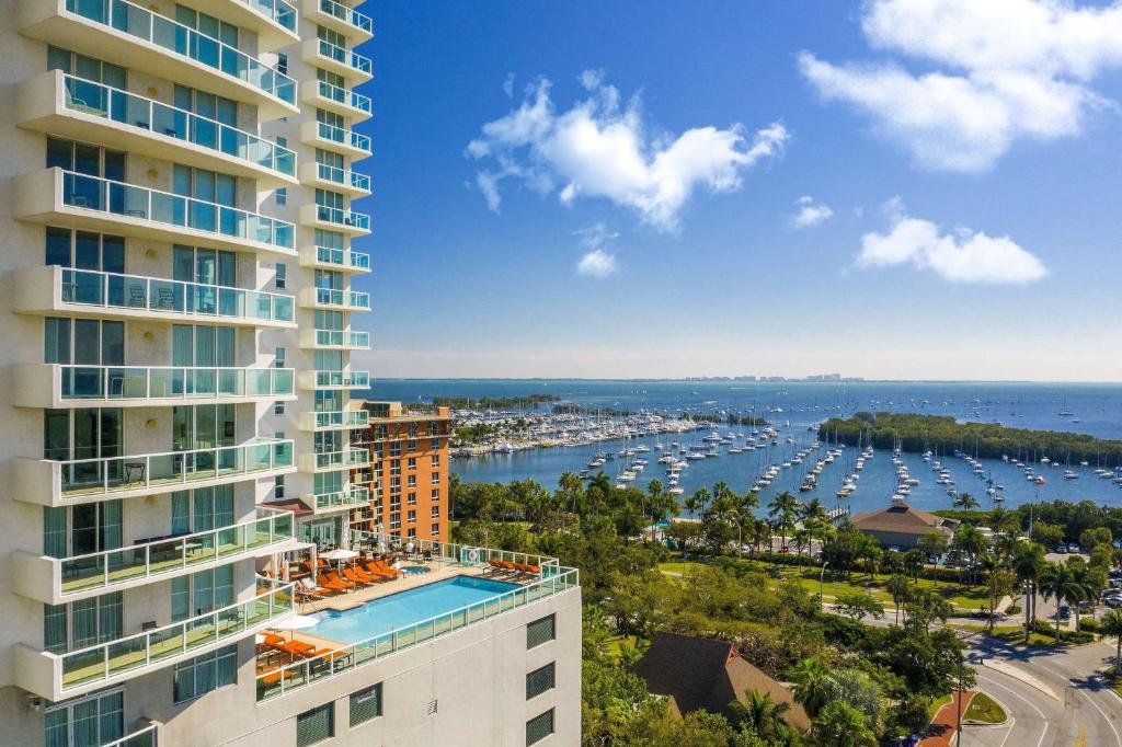 an aerial view of a building and a harbor at Hotel Arya BW Premier Collection in Miami