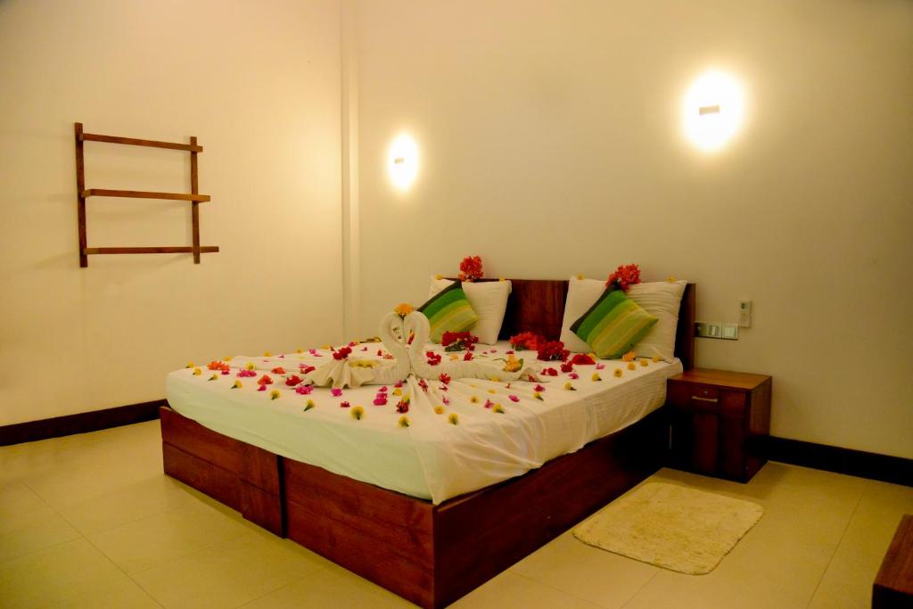 Postel nebo postele na pokoji v ubytování Green View Resort - Anuradhapura