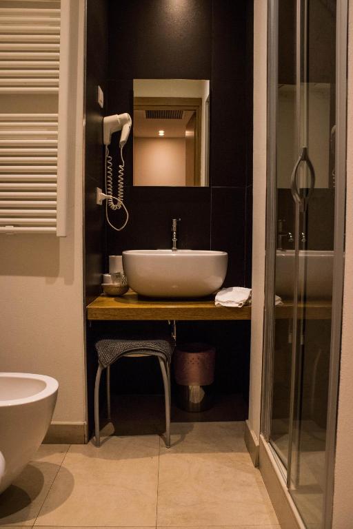 Łazienka w obiekcie Le Querce Hotel