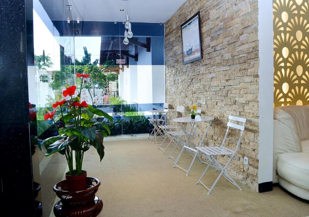 Posezení v ubytování Odaita Hotel Pamekasan Madura