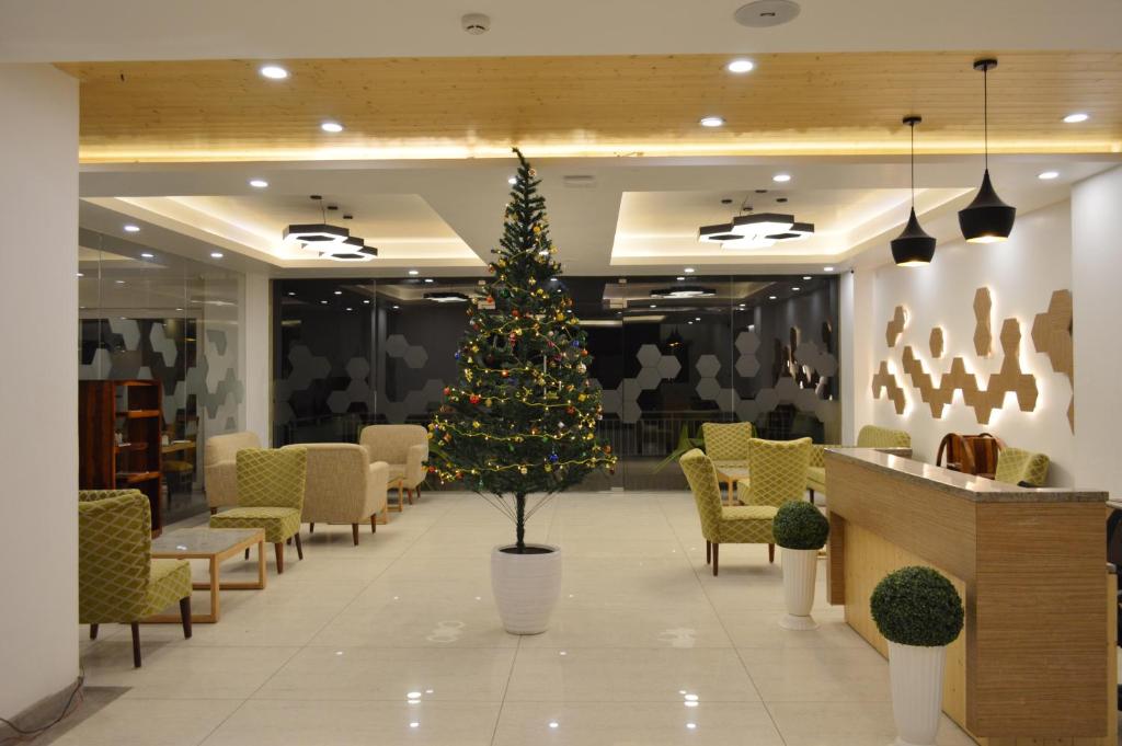 Posezení v ubytování The Orchard Greens Resort - A Centrally Heated Property
