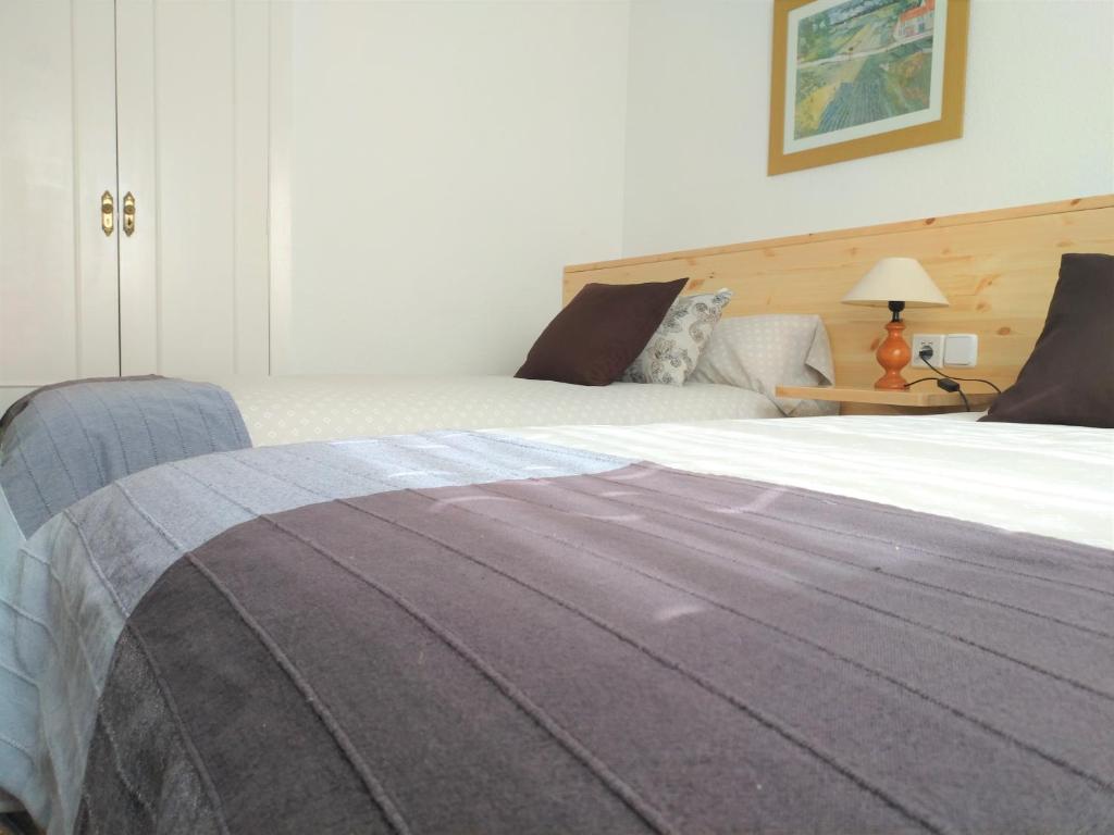 Postel nebo postele na pokoji v ubytování Apartamento Ciudad Jardín