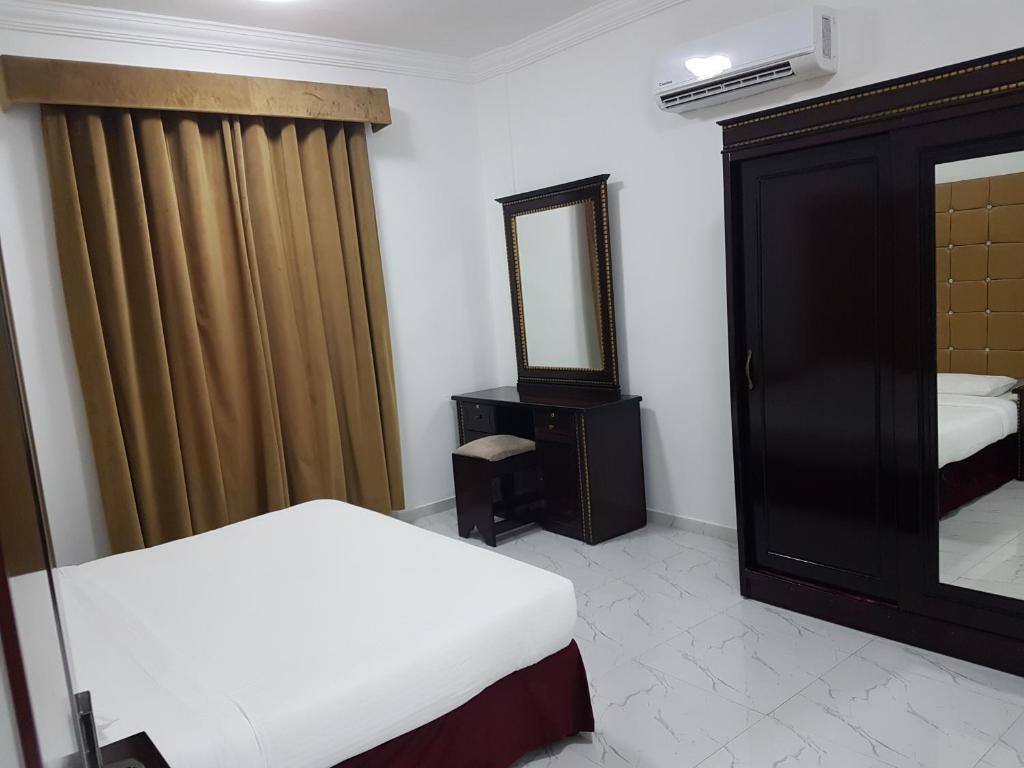 Voodi või voodid majutusasutuse Sea Hotel Apartment toas