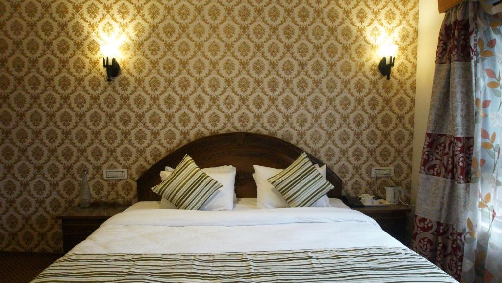 Postel nebo postele na pokoji v ubytování The Shelter Heritage A Boutique Hotel