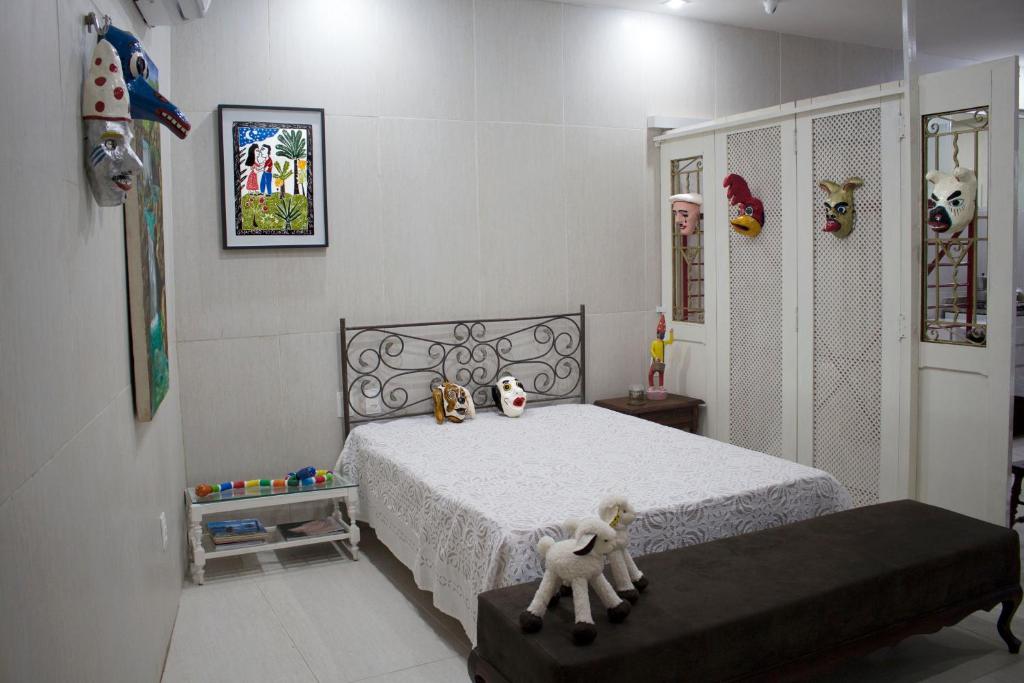 A bed or beds in a room at Casa Mirar Recife de Olinda