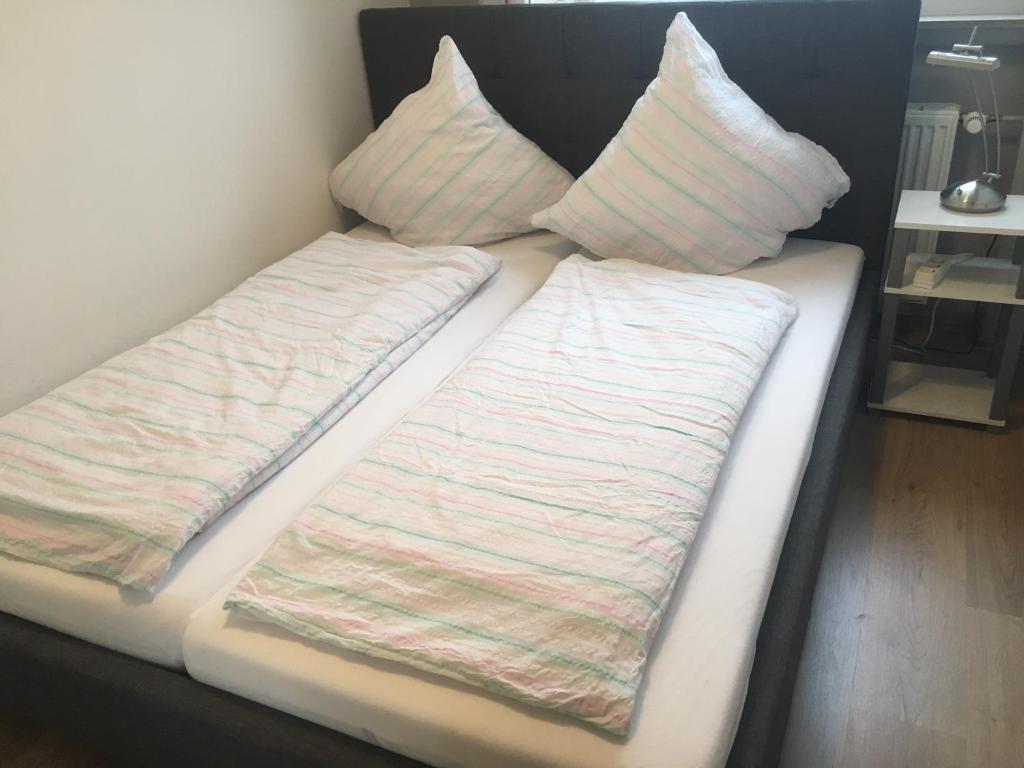 Postel nebo postele na pokoji v ubytování Ferienwohnung am DOC