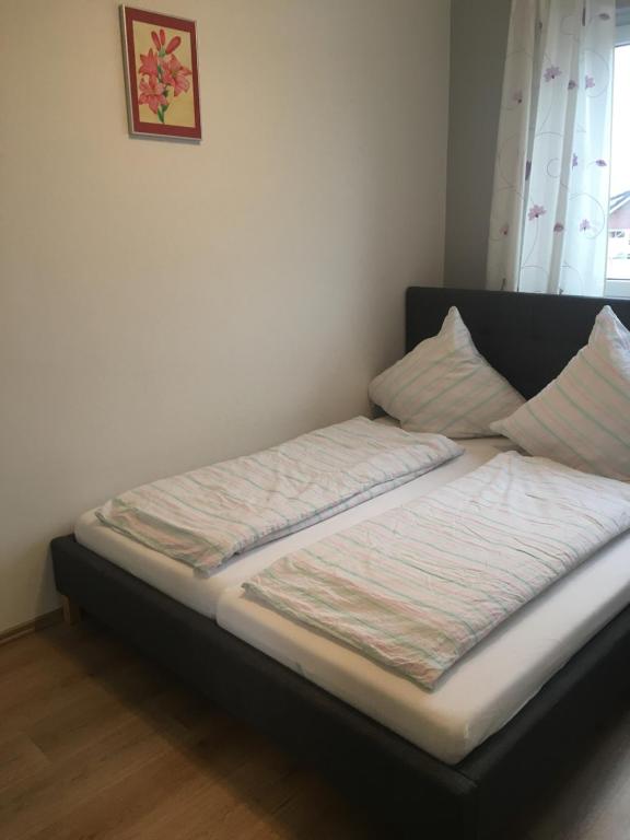 Postel nebo postele na pokoji v ubytování Ferienwohnung am DOC