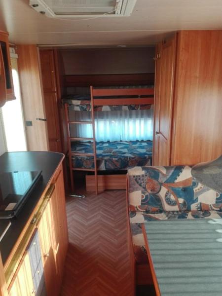 Kuchyň nebo kuchyňský kout v ubytování Sosta Camper La Specchia