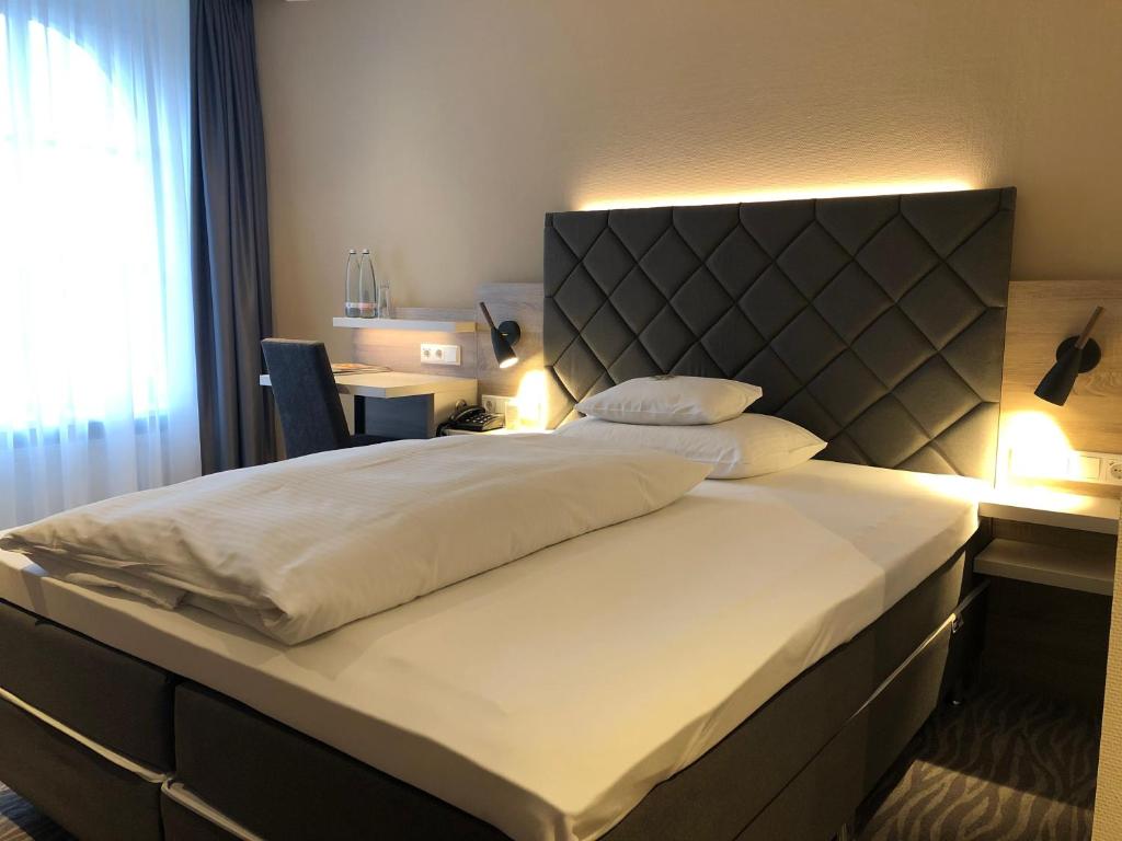 Postel nebo postele na pokoji v ubytování Villa Huxori