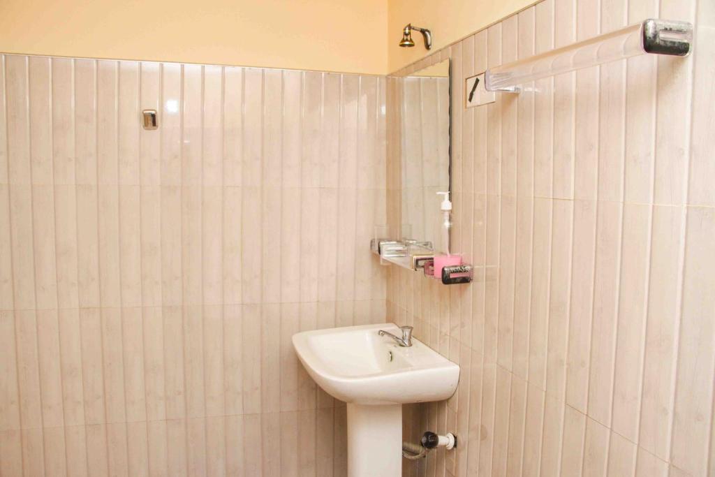 Koupelna v ubytování Manju Homestay