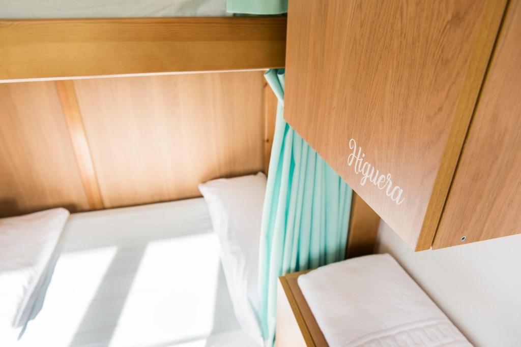 Postel nebo postele na pokoji v ubytování Albergue "La Yalga"