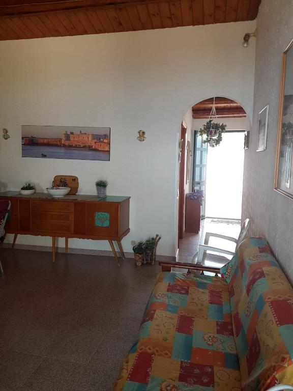 Postel nebo postele na pokoji v ubytování casa fronte mare puro relax