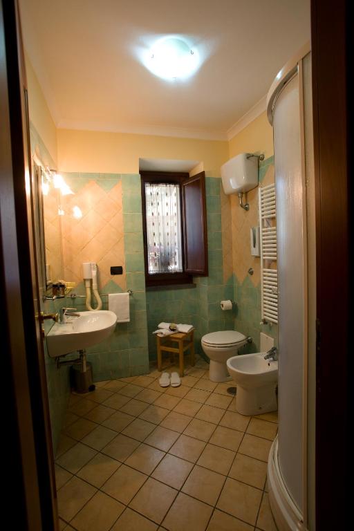 Koupelna v ubytování Hotel Pace